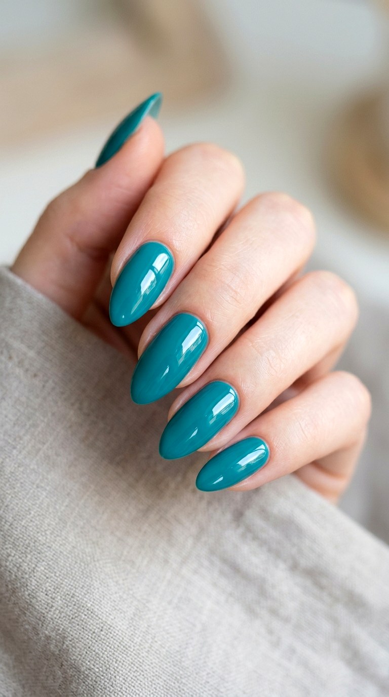 Glossy Teal Almond Nails - 25 Teal Nail Color Ideas