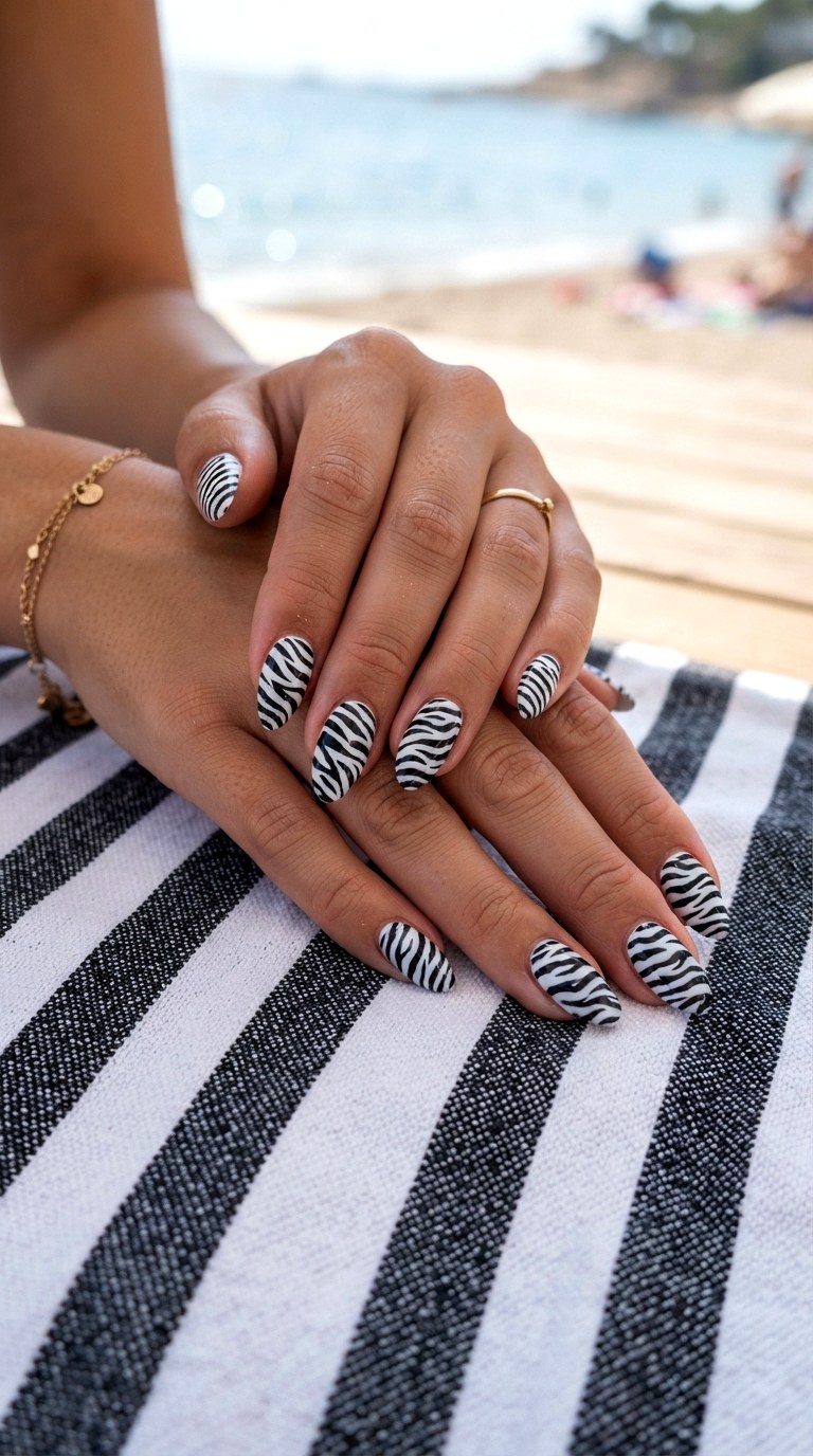 Stiletto Almond Zebra Print Nails - 25 Summer Almond Nail Designs