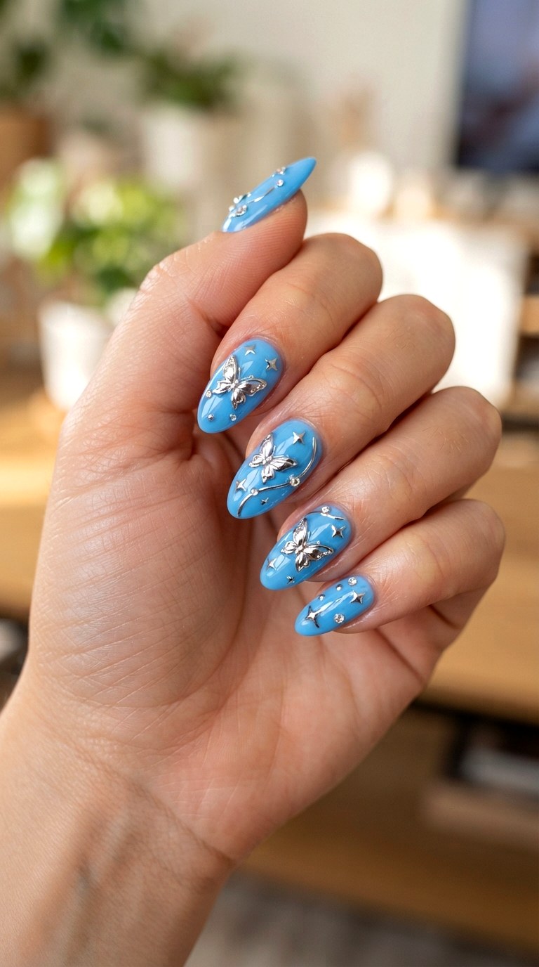 Baby Blue Butterfly Chrome - 22 retro Y2K almond nail ideas