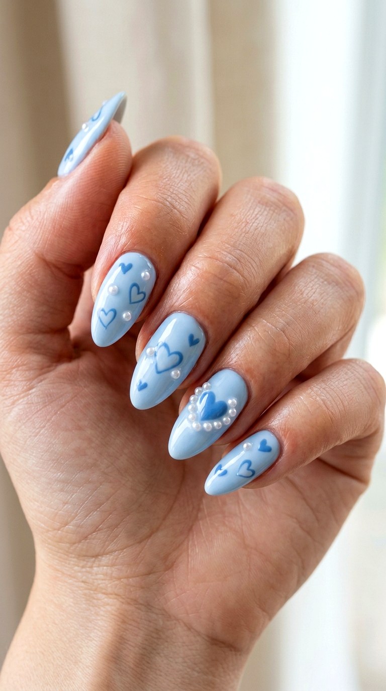 Blue Hearts With Pearl Accents - 21 soft blue hearts nail art inspiration ideas