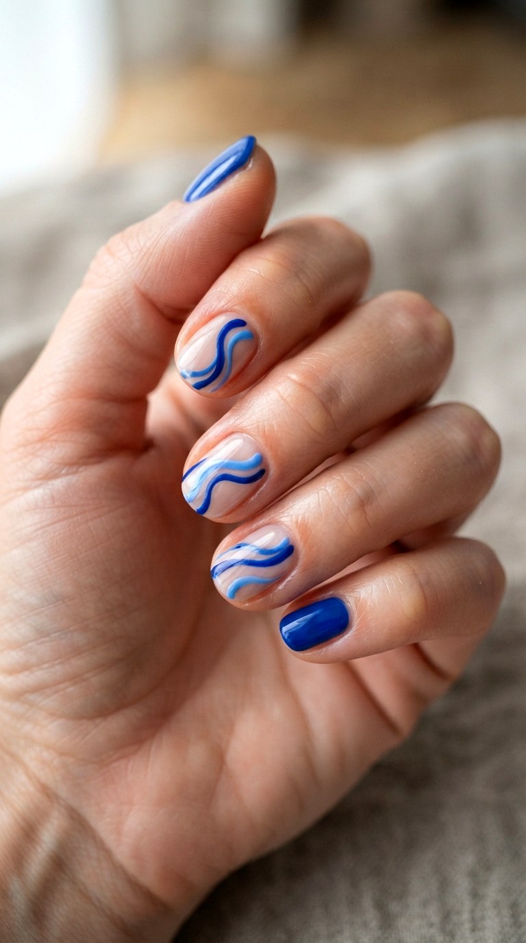 Cobalt Blue Wave Accents - 21 blue short nail art inspiration ideas