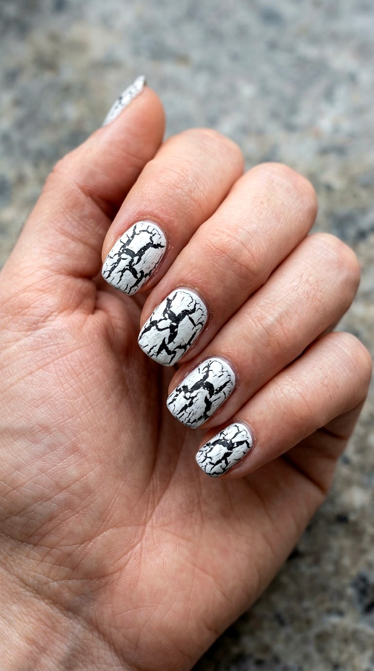 Matte Black Cracked Nails - 23 simple halloween nail design ideas