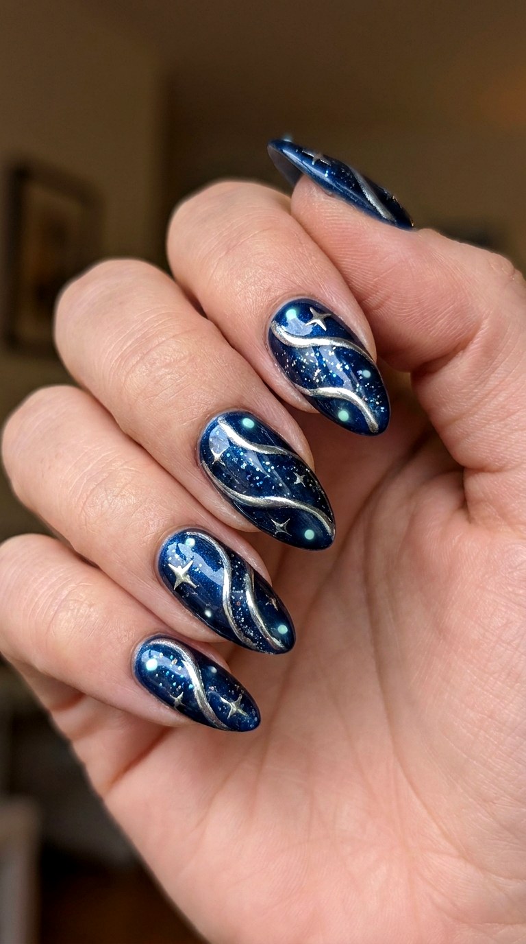Midnight Blue Starry Swirls - 25 magical starry swirl nail ideas