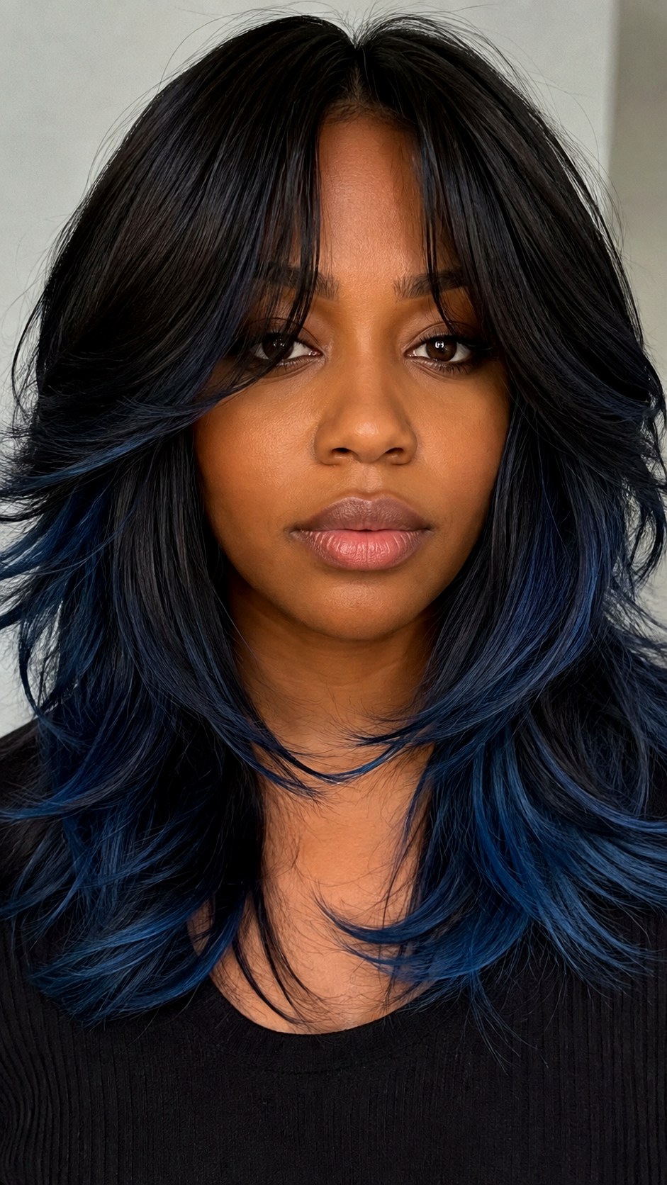 Midnight Blue Tips on a Layered Cut - 23 hair color for brown skin ideas
