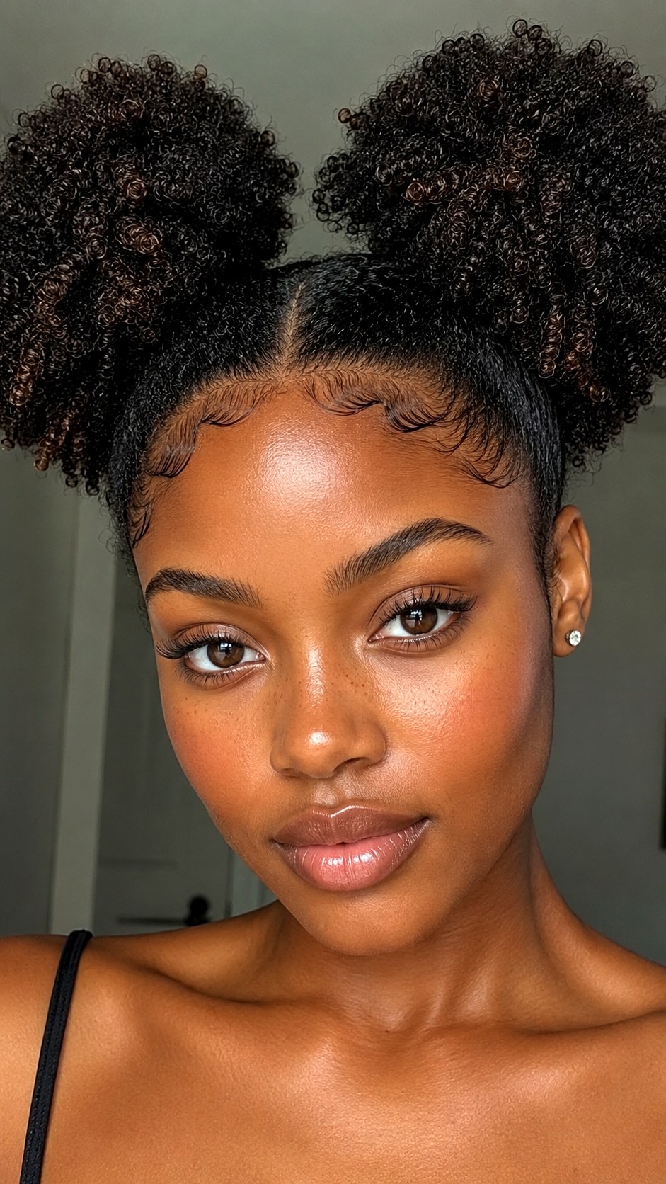 Natural Curly Space Buns - 22 space bun hairstyle ideas
