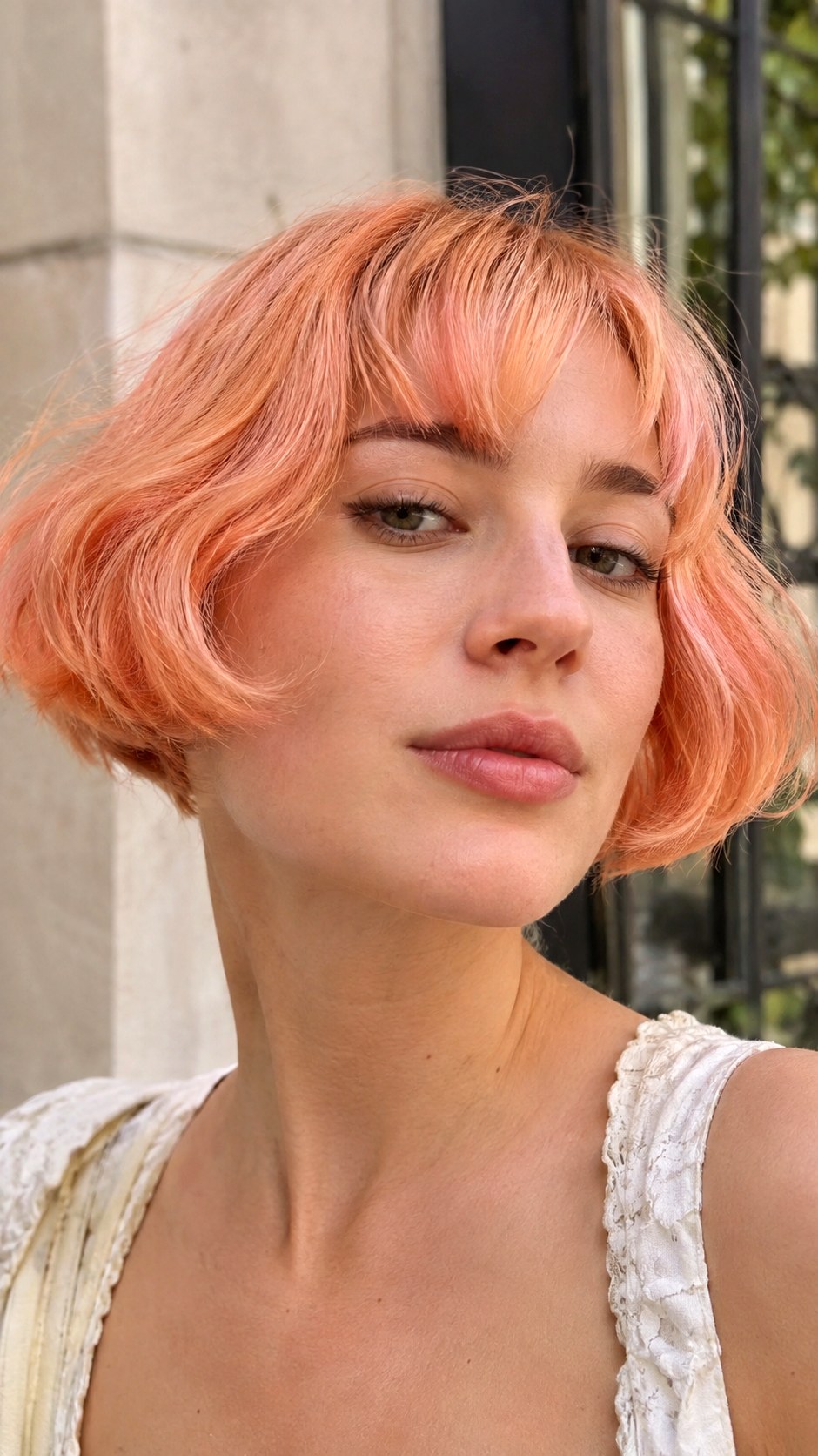 Peach Sorbet French Bob - 22 vivid hair color ideas