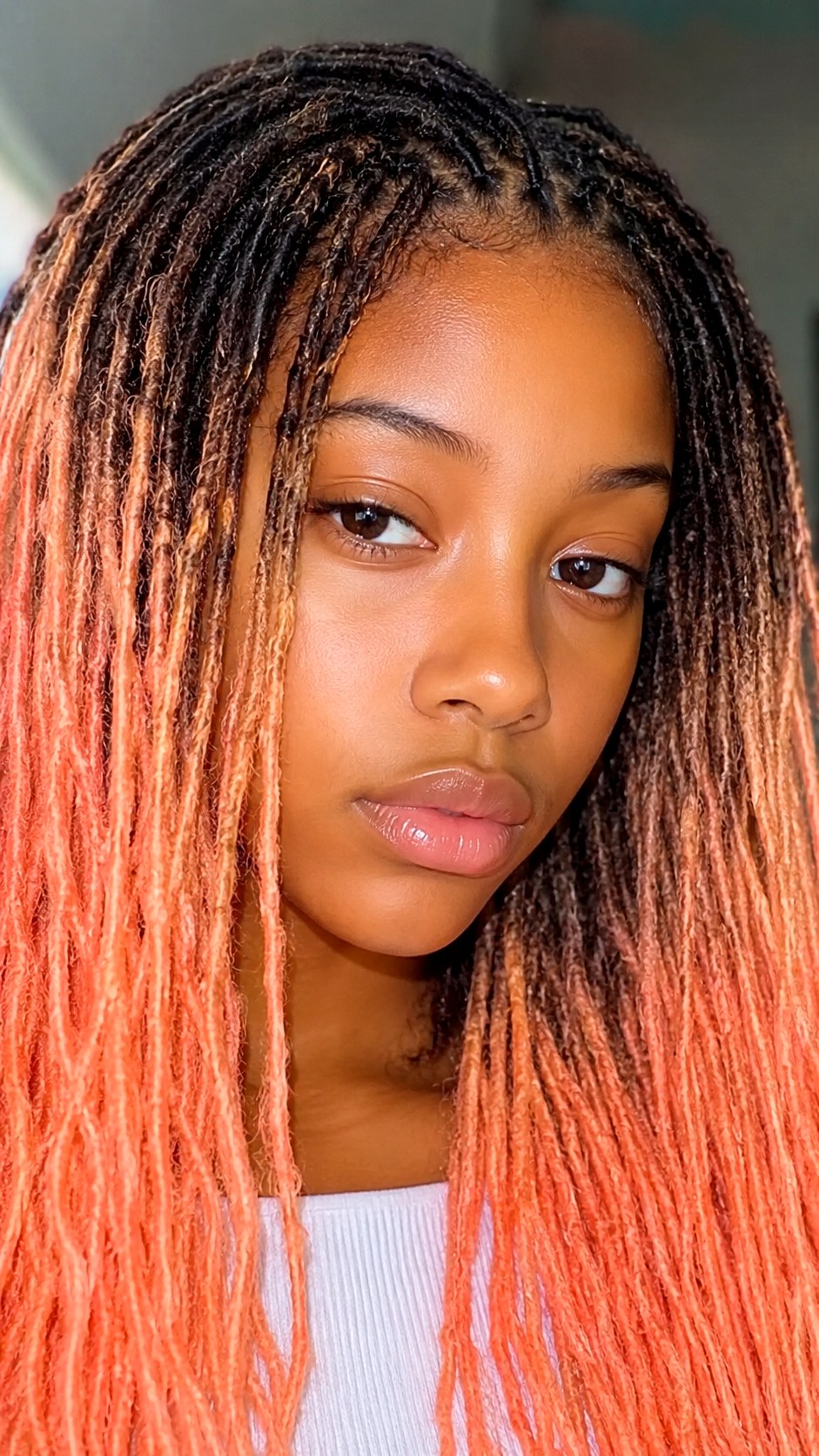 Peach Sorbet Ombre on Micro Locs - 23 hair color for brown skin ideas
