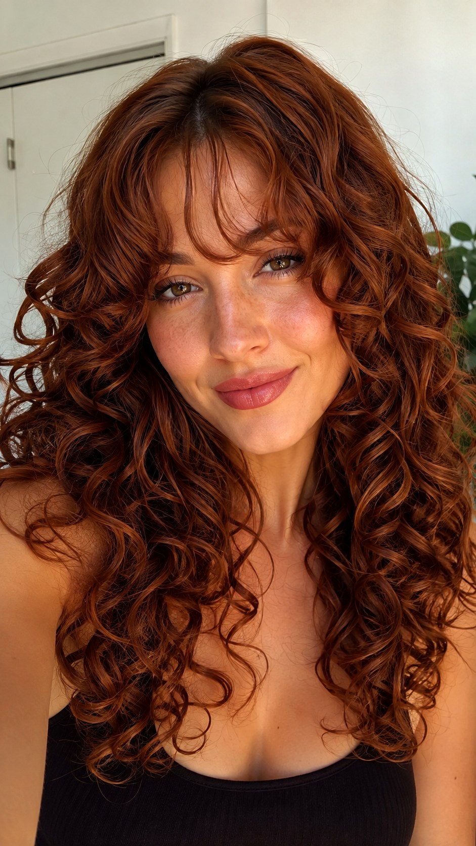 Rich Auburn Curls With Layered Curtain Bangs - 22 Curtain Bangs Long Hair Ideas
