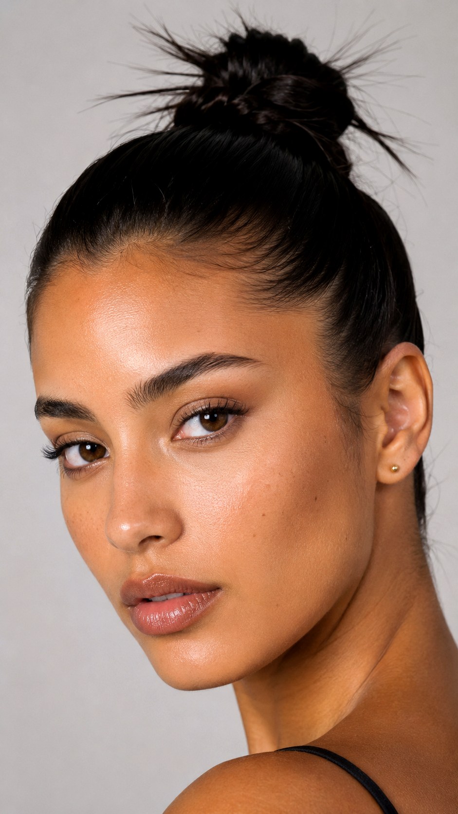 Slicked Back Spiky Bun Aesthetic - 25 y2k bun hairstyle ideas