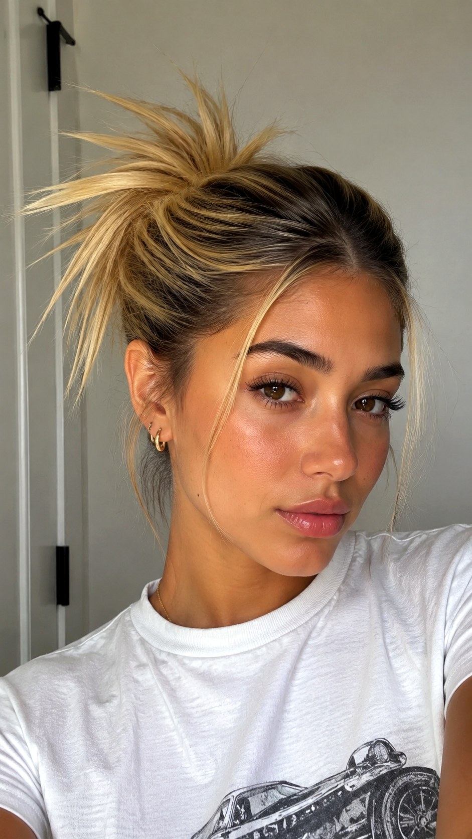 Trendy Spiky Bun Look - 22 y2k hairstyle ideas